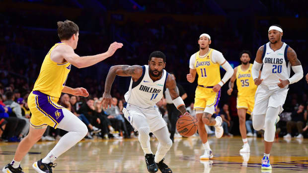 Dallas Mavericks star Kyrie Irving puts pressure on the Los Angeles Lakers' defense in transition.